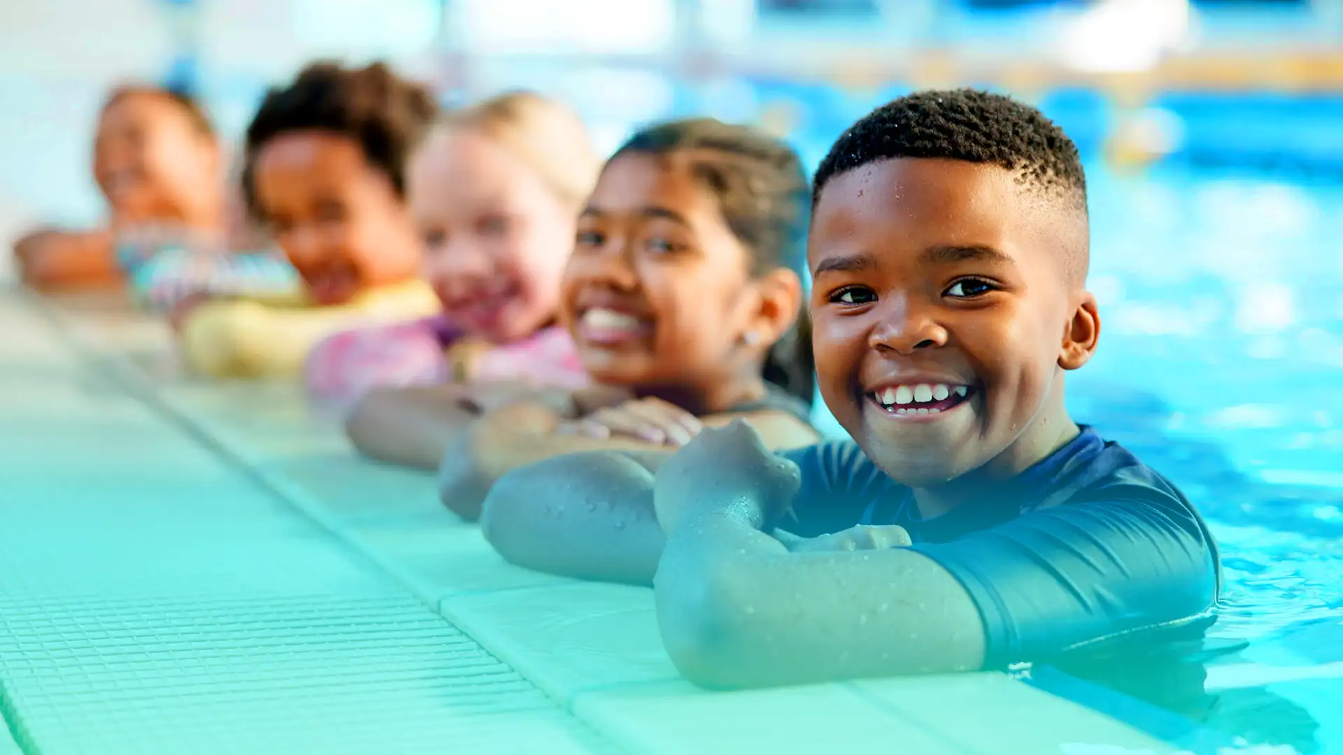 Smiles for Miles: Making friends and building confidence at every swim lesson!